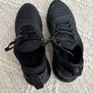 Nike Black Sneakers with Modern Design and Breathable Upper
